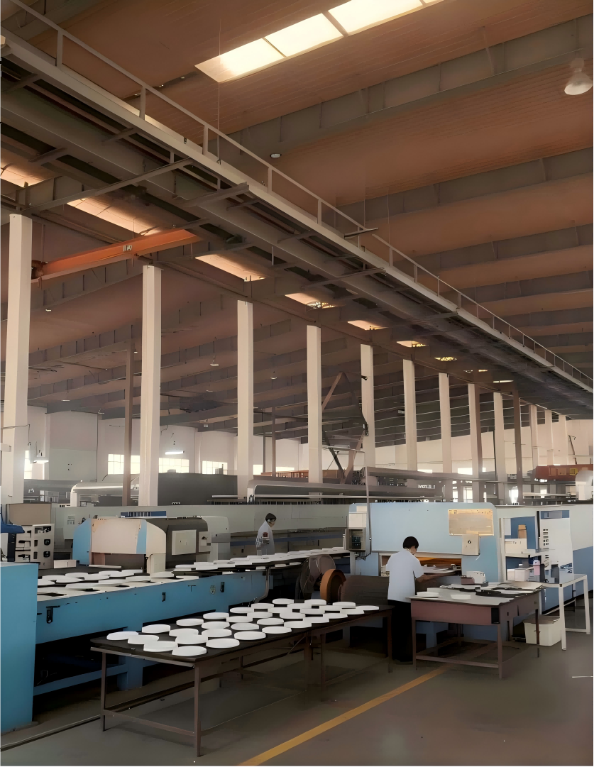 Our facility operates 3 professional enamel production lines with a daily capacity of 5,000 pieces. The streamlined process includes precision spraying, drying, and high-temperature firing (sintering) to ensure premium finish on cast iron pots.